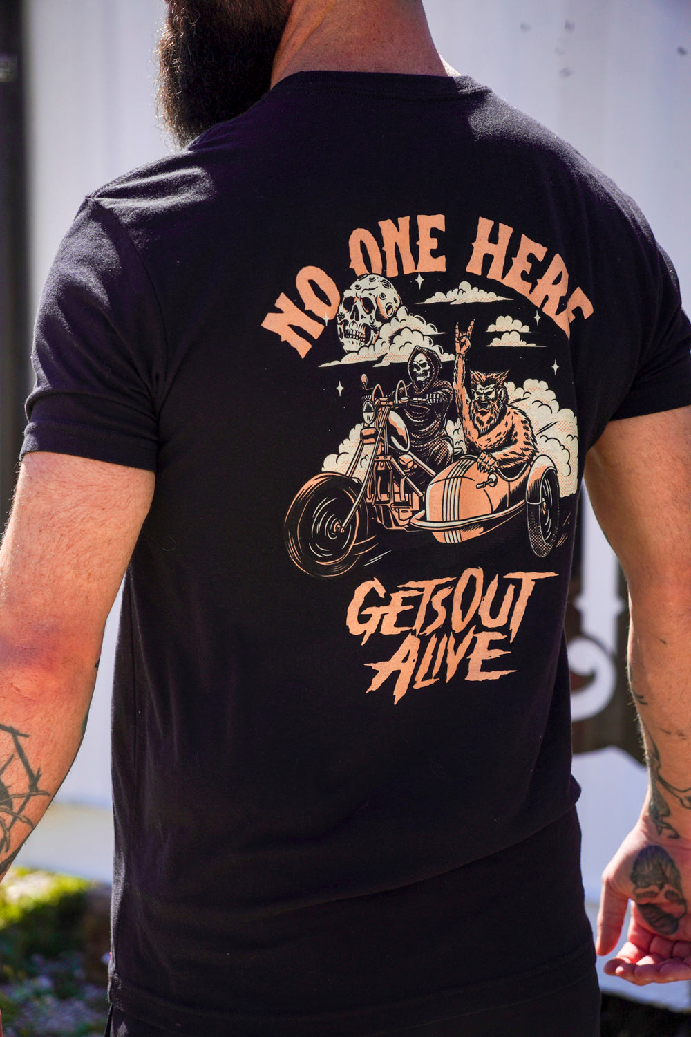 "No One Here Gets Out Alive" Graphic Tee